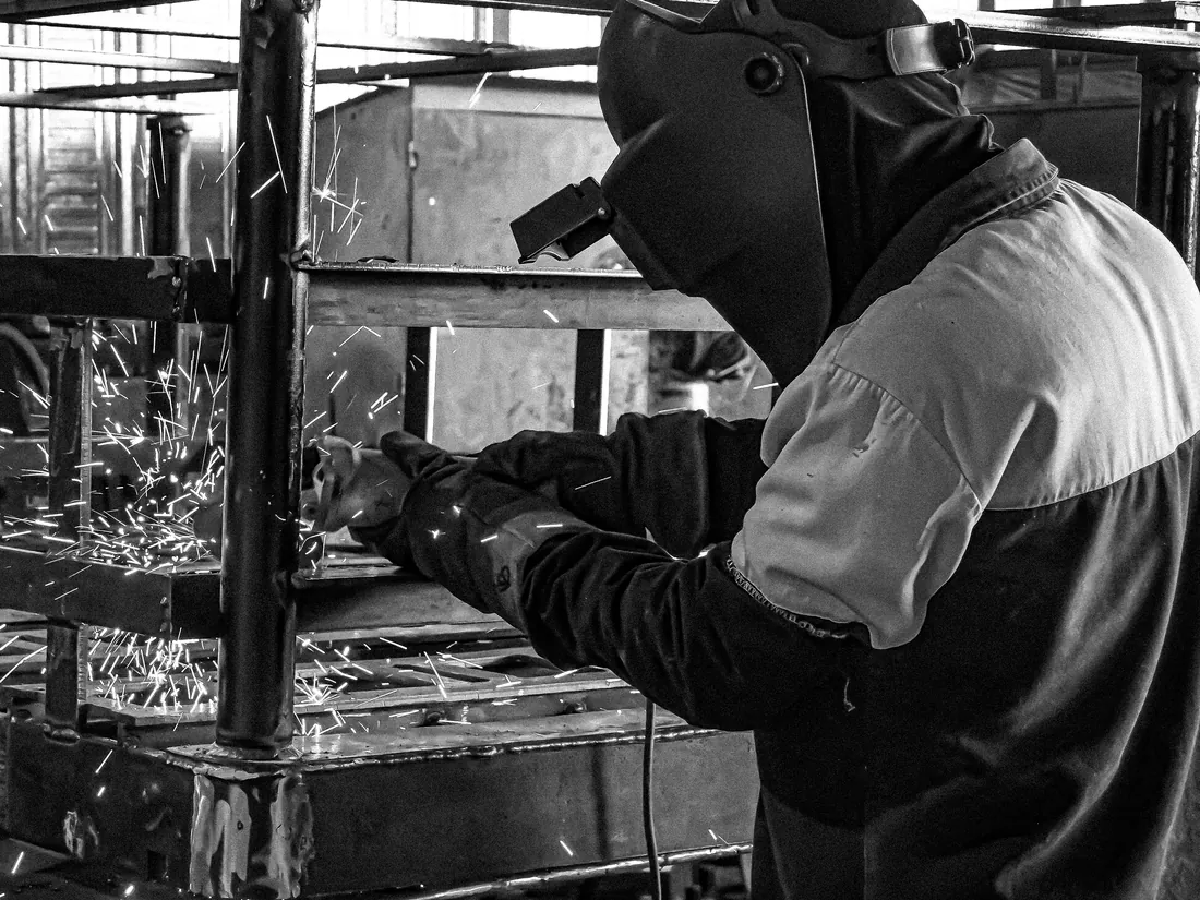 CEMMSA welder working on a structural assembly